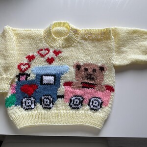 Hand knitted baby jumper with Teddy on a train. 1-2 years. 3 colours.