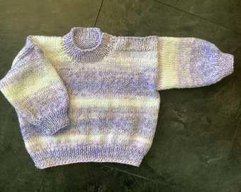 Hand knitted baby jumper in Lilac & White