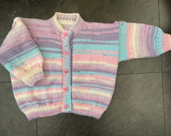 Hand knitted baby cardigan in multicolours.