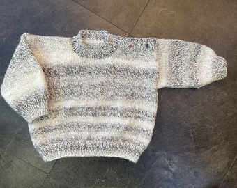 Hand knitted baby jumper in Greys & White. 2 sizes