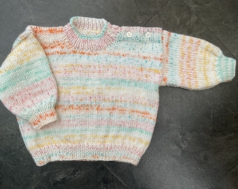 Hand knitted baby jumper. Multicoloured.  1-2 yrs.