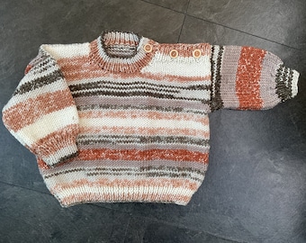 Hand knitted baby jumper in Browns & White. 1-2 yrs.