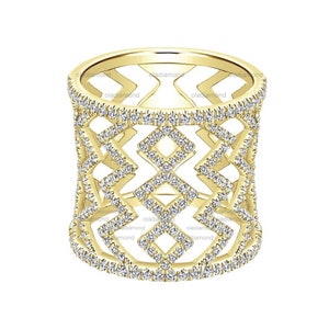 May include: A gold ring with a geometric design set with small diamonds. The ring is made of 14k gold and has a polished finish.
