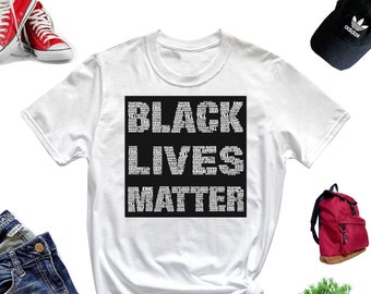 May include: White t-shirt with the words "BLACK LIVES MATTER" in a black rectangular design. The text is composed of names. The image also includes a pair of blue jeans, red sneakers, a black cap, a red backpack, sunglasses, and a bonsai tree.