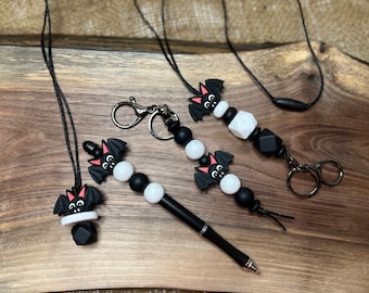 Coffret cadeau petite chauve-souris, longe, porte-clés, stylo perlé, collier sensoriel