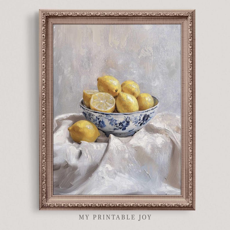May include: A painting of a bowl of lemons on a white tablecloth. The bowl is blue and white with a floral pattern. The lemons are yellow and some are cut in half.