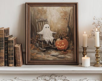 May include: A framed Halloween-themed print featuring a ghost sitting in a rocking chair next to a carved pumpkin. The artwork is set in a forest scene with autumn colors. The text "MY PRINTABLE JOY" is at the top.