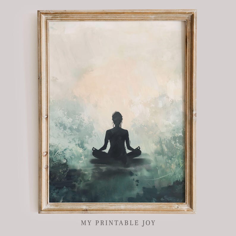 May include: A framed print of a watercolor painting featuring a silhouette of a person meditating in a yoga pose against a background of soft blue and green watercolor washes.