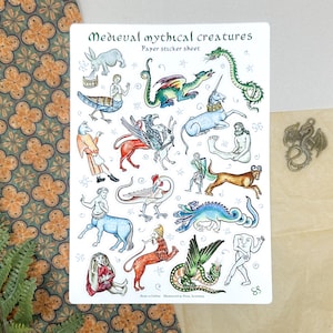 May include: A sticker sheet featuring various medieval mythical creatures, including dragons, unicorns, and centaurs. The sheet has the text "Medieval mythical creatures" and "Paper sticker sheet" in a decorative font. The illustrations are in a vintage style.