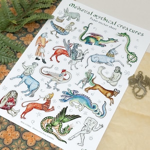 May include: A sheet of paper stickers featuring medieval mythical creatures. The stickers include illustrations of a unicorn, dragon, mermaid, centaur, and other fantastical beings. The text "Medieval mythical creatures" is printed at the top.