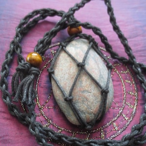 An amulet-necklace that protects against curses and black magic