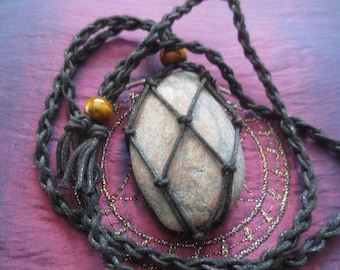 An amulet-necklace that protects against curses and black magic