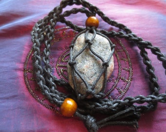 An amulet-necklace that protects against curses and black magic