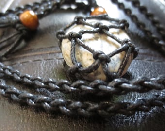 The necklace-amulet designed to suppress and treat psychological tension, stress and mental disorders
