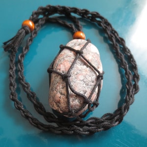 An amulet-necklace that protects against curses and black magic