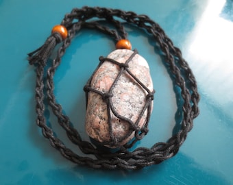 An amulet-necklace that protects against curses and black magic