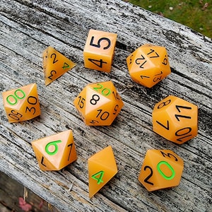Glow in the Dark Pumpkins | 9 Piece Sharp Edge Dice Set | Halloween Dice, Roleplaying Games