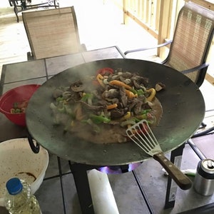 Outdoor Wok with serving trivet.