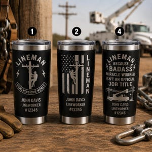 May include: Three black stainless steel tumblers with clear lids, each featuring laser-engraved designs related to linework. The designs include a utility pole, an American flag, and text reading "LINEMAN BECAUSE BADASS MIRACLE WORKER ISN'T AN OFFICIAL JOB TITLE" with the name John Davis and ID #12345.