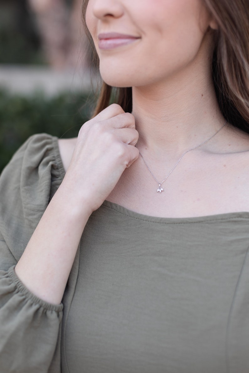 Silver Trio Clover Necklace on adjustable chain.