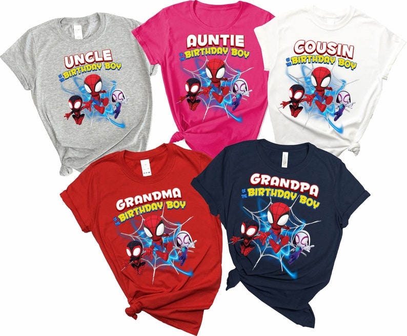 May include: Set of six t-shirts featuring a cartoon Spider-Man design. Each shirt has a different text, including "Uncle", "Auntie", "Cousin", "Grandma", "Grandpa", and "Birthday Boy".