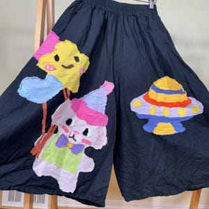 Handmade Patchwork Cropped Pants: Whimsical Space Lamb Appliqué, Black Cotton Gauze