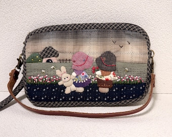 Clutch de pulso artesanal em patchwork, bolsa cottagecore em algodão acolchoado