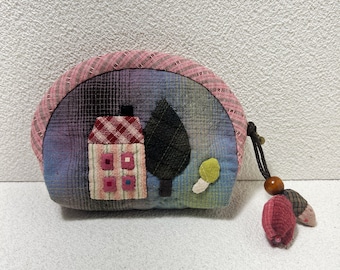 Handgemaakte gewatteerde portemonnee: zakje met cottage patchwork-schelp