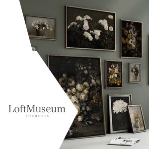 a white table topped with pictures and flowers