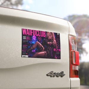 May include: A rectangular sticker featuring a magazine cover titled WAIFUCLUB in bold pink letters. The cover displays an anime-style character in a dark outfit against a neon city background, with text including YOUR WAIFU YOUR WORLD and 愛してる.