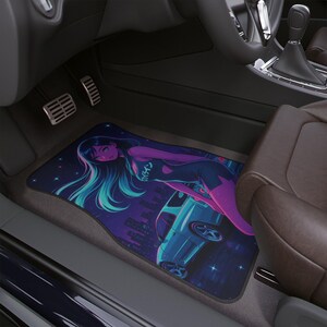 May include: Car floor mat featuring a vibrant anime-style illustration. The design showcases a woman with long, flowing teal hair and a futuristic car against a purple and blue cityscape. The mat is rectangular and fits in a car.