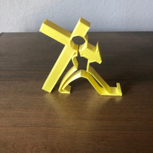 Cool phone holder of Jesus holding the cross