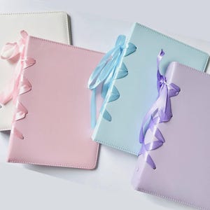 Carpeta de tarjetas fotográficas de cuero con cinta A5