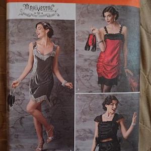 May include: Simplicity sewing pattern 1247 R5 for sizes 14-22, 40-48, and 42-50. The envelope features illustrations of three sleeveless dress designs with fringe detailing, including a grey velvet dress, a red satin dress, and a black two-piece set.