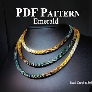 May include: PDF pattern for a beaded necklace called "Emerald". The necklace is made of three strands of beads in shades of gold, green, and white.
