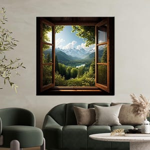 May include: A canvas print showing a mountain landscape seen through an open wooden window. The artwork features a vibrant view of green trees, a lake, and snow-covered mountains under a blue sky. The window frame is a warm brown colour.