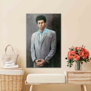 May include: A painting of a man with a large afro wearing a gray suit jacket over a light blue shirt. The man is standing with his hands clasped in front of him and has a serious expression on his face.