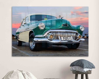 May include: A vintage green and white Buick car with chrome accents. The car has a license plate that reads "P075912".