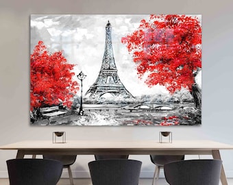 May include: A black, white, and red painting of the Eiffel Tower in Paris. The artwork features the iconic tower in the center, with vibrant red trees on either side. A bridge and a lamppost are also visible.