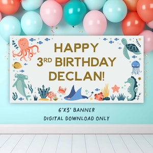 May include: A white banner with a blue and orange underwater theme. It says "Happy 3rd Birthday Declan!" with an octopus, seahorse, starfish, and other sea creatures. The banner is 6' x 3' and is a digital download only.