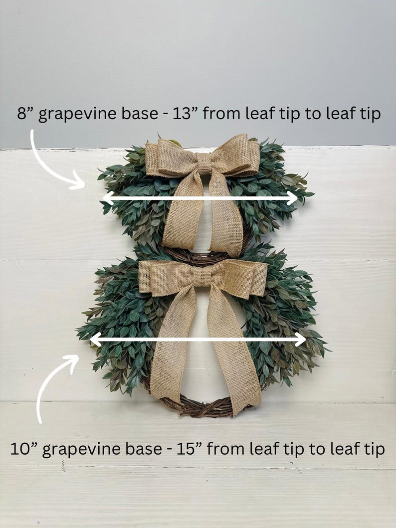 May include: Two grapevine wreaths with burlap bows. The smaller wreath is 8 inches in diameter and 13 inches wide. The larger wreath is 10 inches in diameter and 15 inches wide.