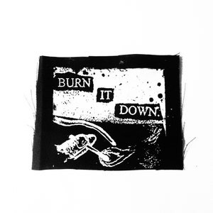May include: Black and white patch with the text "BURN IT DOWN." The patch features a stylized image of a hand holding a lit match with flames.
