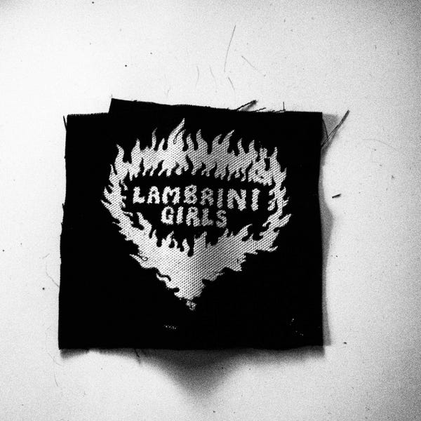 Parche de la banda femenina Lambrini