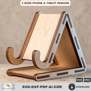 May include: A light-colored wooden stand for phones and tablets with a triangular frame and two curved front supports. The design features dark-edged layered wood construction. Text on the image reads 2 SIZES PHONE & TABLET DESIGNS and 3mm 1/8in.