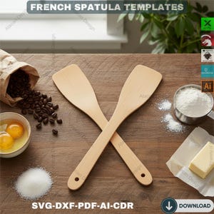 May include: Two wooden spatulas are crossed on a wooden surface. The image includes ingredients like eggs, flour, butter, and coffee beans, suggesting a baking theme. Text at the top reads "FRENCH SPATULA TEMPLATES" and at the bottom "SVG-DXF-PDF-AI-CDR".