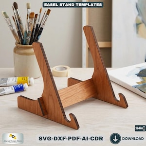 May include: A wooden easel stand with a natural finish. The stand has a horizontal support and angled legs with a curved top. The text "EASEL STAND TEMPLATES" is at the top. The bottom of the image has the text "SVG-DXF-PDF-AI-CDR" and "DOWNLOAD".