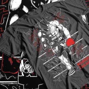 May include: A black t-shirt with a white illustration of a boxer in a boxing ring. The boxer is wearing boxing gloves and shorts. The text "MAMORI TAKARA" is visible on the shirt.