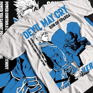 May include: White t-shirt with a blue and black graphic of a character from the video game Devil May Cry. The text "Devil May Cry" and "Son of Sparda" is printed on the shirt. The text "Power controls everything... and without power you cannot protect anything" is also printed on the shirt.
