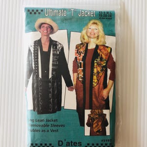 May include: A package for the "Ultimate T" Jacket sewing pattern. The package features two women modeling the jacket, with removable sleeves and the option to be worn as a vest. The package includes sizes XS-3X.
