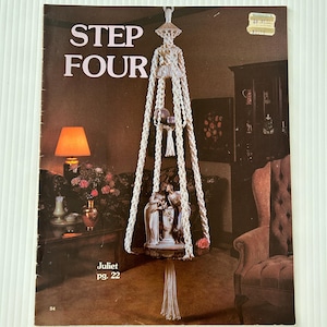 May include: A vintage magazine cover with the text "STEP FOUR" in large letters. The image features a macrame plant hanger with a small statue inside. The magazine is titled "Juliet" on page 22.